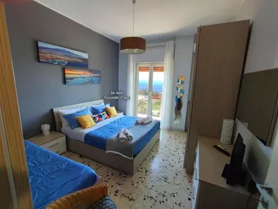 Letto o letti in una camera di La mia seconda casa ad Aci Castello