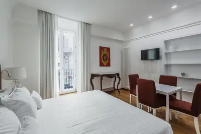 Letto o letti in una camera di RG7 Apartments
