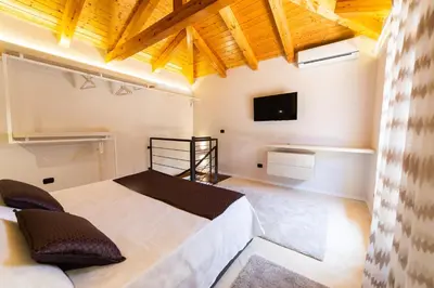 Letto o letti in una camera di Suite Cavour - SunTripSicily