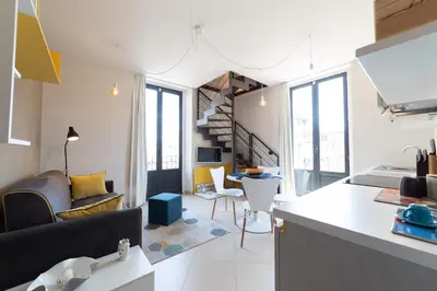 Area soggiorno di Suite Cavour - SunTripSicily