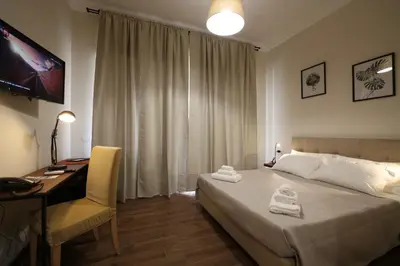 Letto o letti in una camera di Khome Rooms & Apartment