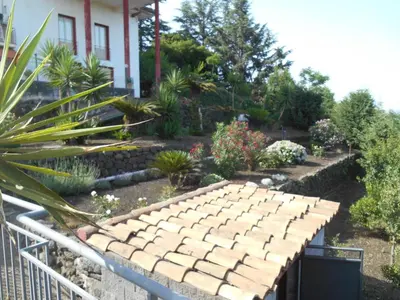 Giardino di Al Villino Sunrise appartamento in villa con piscina