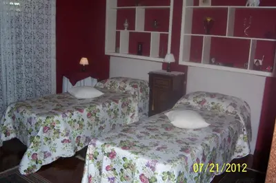 Letto o letti in una camera di Villa Carmen on Etna