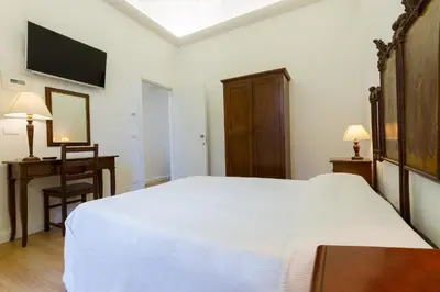Letto o letti in una camera di Casale Catania