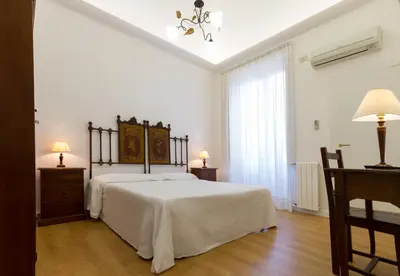 Letto o letti in una camera di Casale Catania