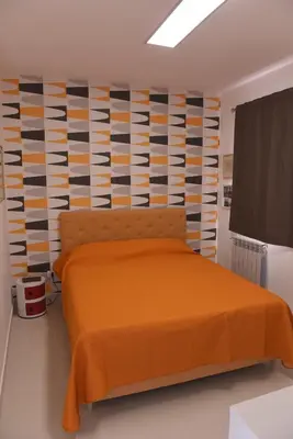 Letto o letti in una camera di Palazzo Galifi
