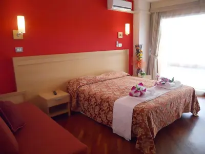 Letto o letti in una camera di Catania Crossing B&B - Rooms & Comforts