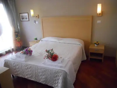 Letto o letti in una camera di Catania Crossing B&B - Rooms & Comforts