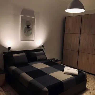 Letto o letti in una camera di La Dimora del Principe - Appartamento
