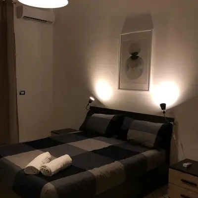 Letto o letti in una camera di La Dimora del Principe - Appartamento
