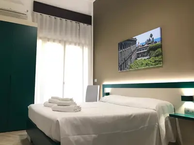 Letto o letti in una camera di Guesthouse Ughetti 21