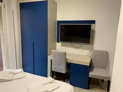 TV o dispositivi per l'intrattenimento presso Guesthouse Ughetti 21