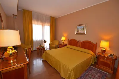 Letto o letti in una camera di Garden Hotel Catania