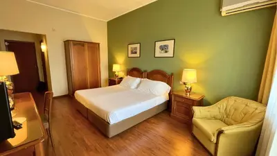 Letto o letti in una camera di Garden Hotel Catania