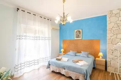 Letto o letti in una camera di Mediterranean Charm villa con piscina al mare