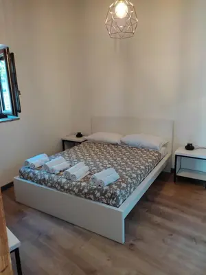 Letto o letti in una camera di Case Gemmellaro - Family&Friends