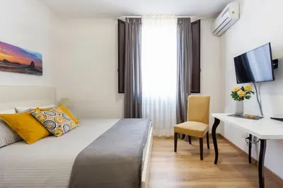 TV o dispositivi per l'intrattenimento presso Centre Apartment Grotte Bianche
