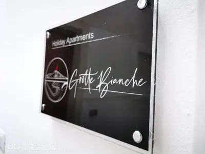 Certificato, attestato, insegna o altro documento esposto da Centre Apartment Grotte Bianche