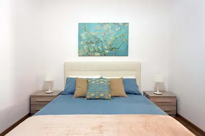 Letto o letti in una camera di Centre Apartment Grotte Bianche 2