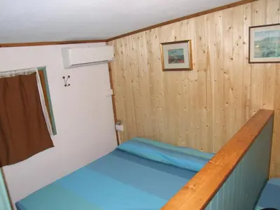 Letto o letti in una camera di Camping Jonio