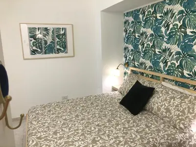 Letto o letti in una camera di Villa Lattea