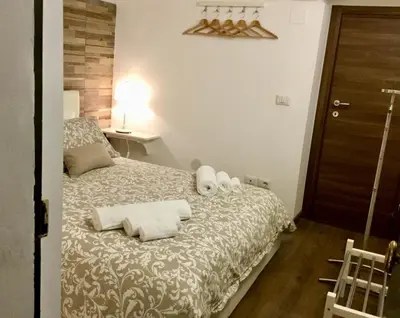 Letto o letti in una camera di Borgo Empedocle House