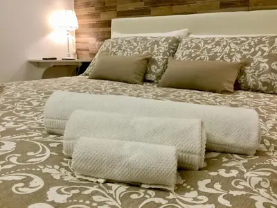 Letto o letti in una camera di Borgo Empedocle House
