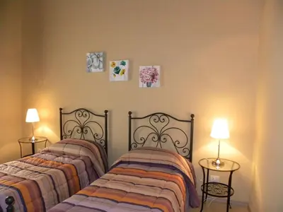 Letto o letti in una camera di B&B Residenza Umberto