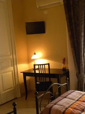 Letto o letti in una camera di B&B Residenza Umberto