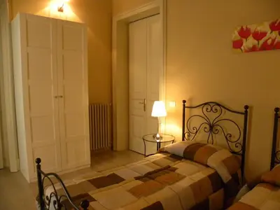 Letto o letti in una camera di B&B Residenza Umberto