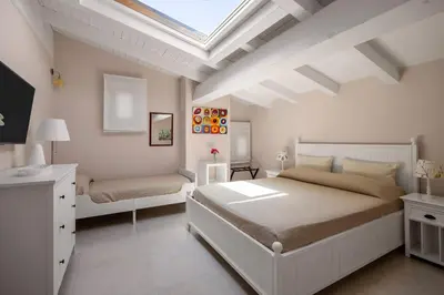 Letto o letti in una camera di Luxury Panoramic Loft with heated pool near Catania, Taormina, the Sea and Mount Etna by SicilianRelaxingHomes