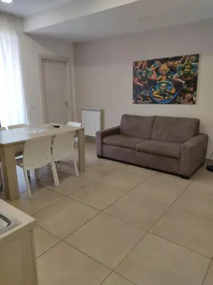 Area soggiorno di Residence I Dioscuri by RECEPTIO