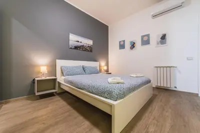 Letto o letti in una camera di Ambasciatori B&B