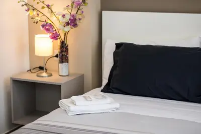 Letto o letti in una camera di Ambasciatori B&B