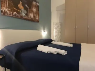 Letto o letti in una camera di Il vicolo home