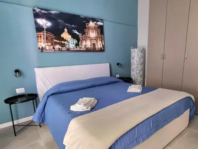Letto o letti in una camera di Il vicolo home