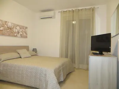 Letto o letti in una camera di Villa Leonardi