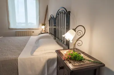 Letto o letti in una camera di Casa Rosario