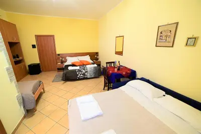 Letto o letti in una camera di B&B Dimora dell' Etna
