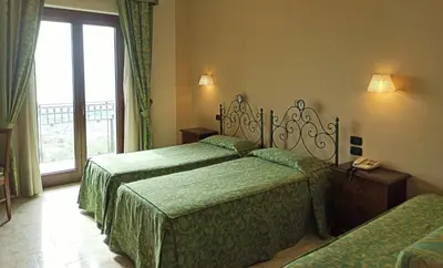 Letto o letti in una camera di Hotel Primavera Dell'Etna