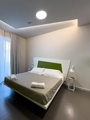 Letto o letti in una camera di Ciclope Resort