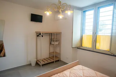 Letto o letti in una camera di La Zagara