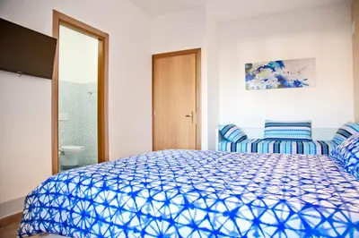 Letto o letti in una camera di B&B Etna Europa