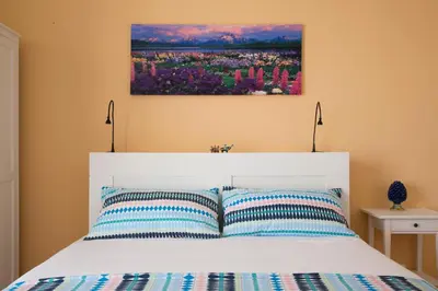 Letto o letti in una camera di B&B Etna Europa