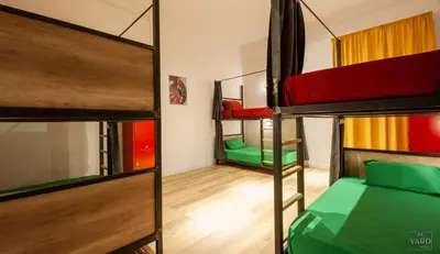 Letto o letti in una camera di The Yard Hostel