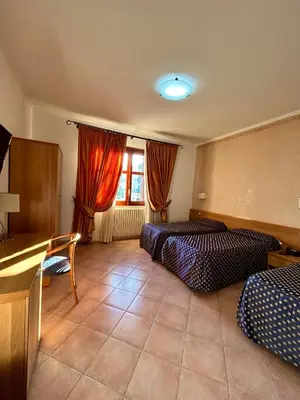 Letto o letti in una camera di Hotel Lachea