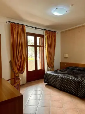 Letto o letti in una camera di Hotel Lachea