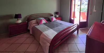 Letto o letti in una camera di Casa sulla spiaggia di Santa Tecla