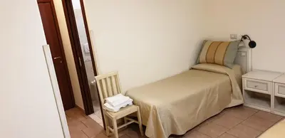 Letto o letti in una camera di RS San Sebastiano Holidays