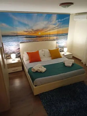 Letto o letti in una camera di La Petite Maison